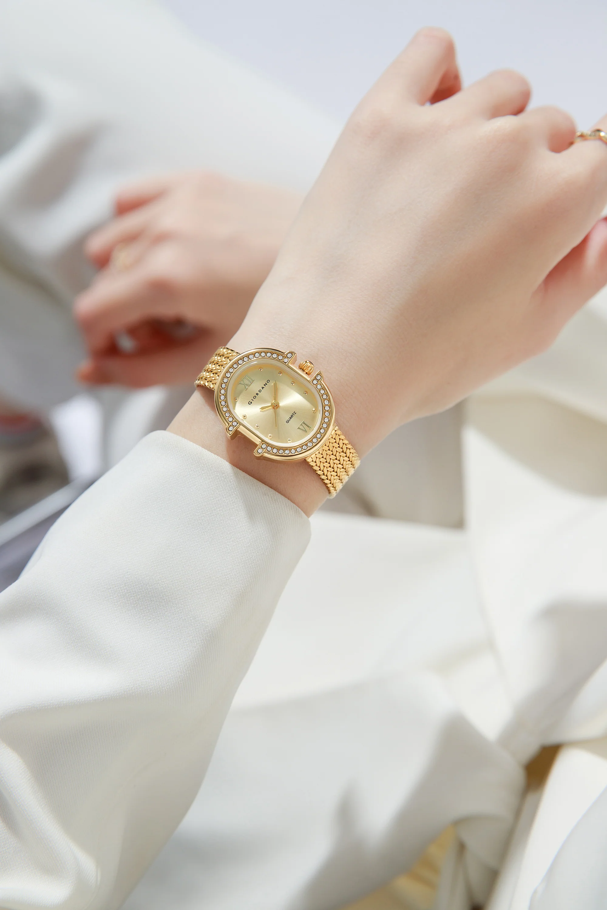 Giordano Analog Watch for Women with Oval Gold Dial, Crystal Studded Bezel, Roman Indices & Gold Stainless Steel Mesh Strap GZ-60168-33 - Image 2